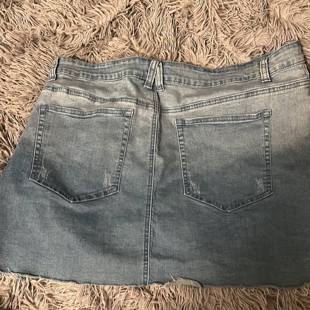 2 denim skirts. Black zipper one is from Rue21 and the other Fashion Nova.